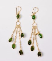 Lot 2655 - A pair of diopside tassel earrings, the four...