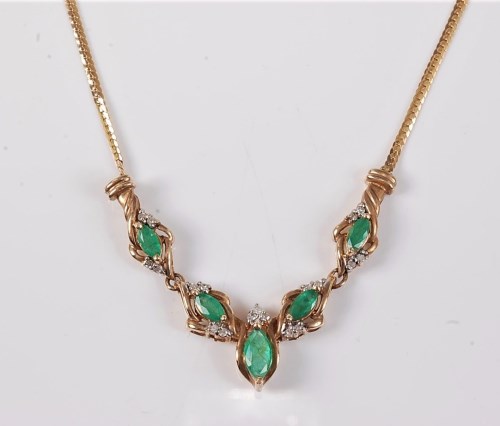 Lot 2656 - An emerald and diamond necklace, the five...