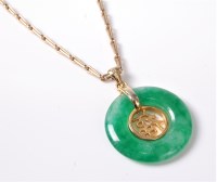 Lot 2658 - A Chinese jade pendant and 9ct chain, the...