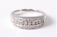 Lot 2666 - An 18ct diamond ring, the central row of round...