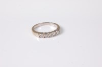 Lot 2667 - An 18ct five stone diamond ring, the five...