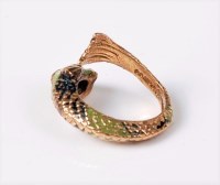 Lot 2670 - A 9ct and enamel sea serpent ring, the...
