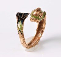 Lot 2670 - A 9ct and enamel sea serpent ring, the...