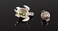 Lot 2673 - A peridot and diamond turtle lapel pin/brooch,...