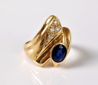 Lot 2682 - A 14ct sapphire and white hardstone ring, the...