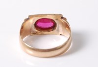 Lot 2715 - A synthetic pink sapphire ring, the oval pink...