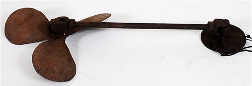 Lot 73 - An iron boat propeller and coupling shaft with...