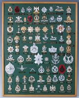 Lot 243 - A large collection of modern military badges...