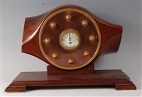 Lot 3 - An early 20th century propeller mantel clock,...