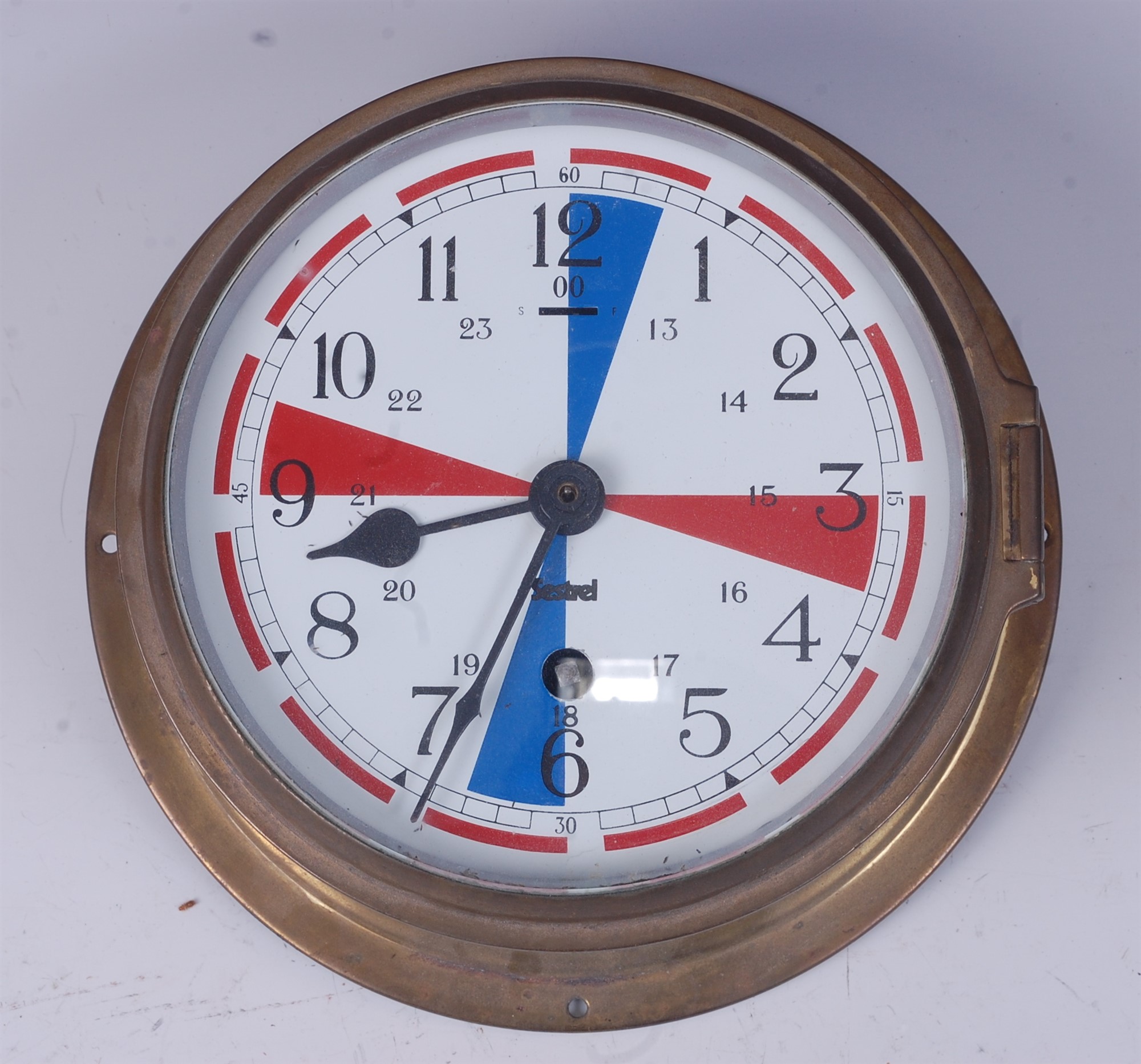 Lot 64 - A Sestrel brass cased ships radio room clock,