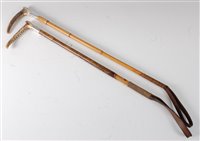 Lot 430 - An early 20th century riding crop, having a...