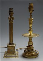 Lot 6 - A modern brass table lamp, having fluted...
