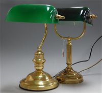 Lot 22 - A lacquered brass desk lamp, having adjustable...