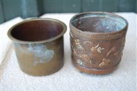 Lot 29 - A pair of Chinese bronze urns, each having a...