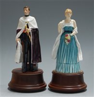 Lot 17 - A pair of Royal Doulton figurines; Lady Diana...
