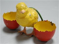 Lot 34 - A novelty egg-cup in the form of a hatched...