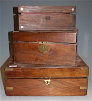 Lot 43 - A Victorian walnut and brass bound writing...
