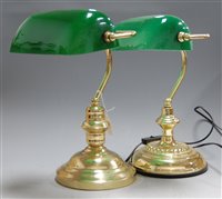 Lot 60 - A pair of modern brass desk lamps, each having...