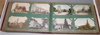 Lot 103 - An early 20th century postcard album and...