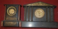 Lot 107 - A late Victorian black slate mantel clock;...