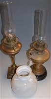 Lot 96 - An early 20th century brass pedestal oil lamp...