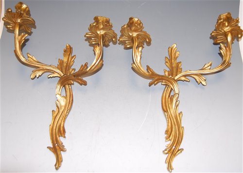 Lot 135 - A set of four Rococo style gilt metal twin...