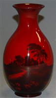 Lot 189 - A Royal Doulton flambé vase, having printed...