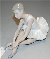 Lot 196 - A Nao Spanish porcelain figure of a seated...
