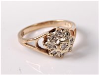 Lot 339 - A 9ct gold diamond cluster ring, all illusion...
