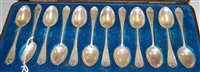 Lot 223 - A late Victorian cased set of 12 silver...