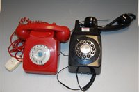 Lot 257 - A black plastic wall mounted telephone...