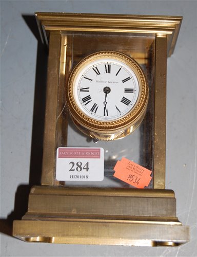 Lot 284 - A lacquered brass cased four-glass carriage...