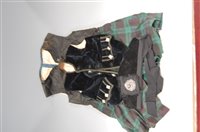 Lot 278 - A child's tartan dress together with a blue...