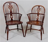 Lot 2624 - A set of ten elm and ash Windsor chairs, each...