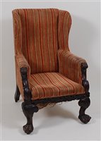 Lot 2625 - A Victorian walnut framed wing armchair, the...