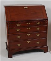 Lot 2643 - A George III mahogany bureau, the hinged fall...