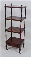 Lot 2645 - A George IV rosewood four-tier whatnot, on...