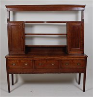 Lot 2646 - A late Georgian oak and mahogany crossbanded...