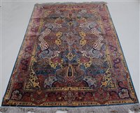 Lot 2629 - A Persian woven silk Tabriz type rug, having a...