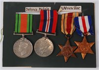 Lot 315 - A collection of four WW II medals to include...