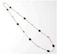 Lot 2255 - A 14ct sapphire and aquamarine necklace, the...