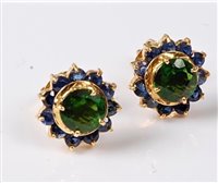 Lot 2239 - A pair of diopside and sapphire earstuds, the...