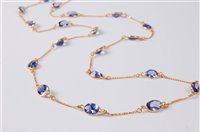 Lot 2270 - A '14k' tanzanite necklace, the oval...