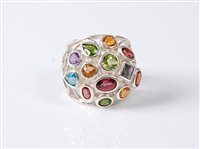Lot 2617 - A multi gemset bombe ring, the mixed cut...