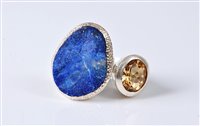 Lot 2631 - A lapis lazuli and citrine ring, the rough cut...