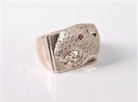 Lot 368 - A silver panther ring, the stylised head pave...