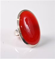 Lot 345 - A silver and carnelian ring, the large oval...