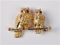 Lot 2626 - An 18ct owl brooch, the two naturalistically...