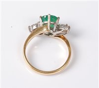 Lot 2216 - An 18ct emerald and diamond ring, the round...