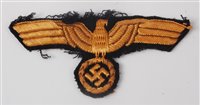 Lot 210 - A German Wehrmacht cloth badge.
